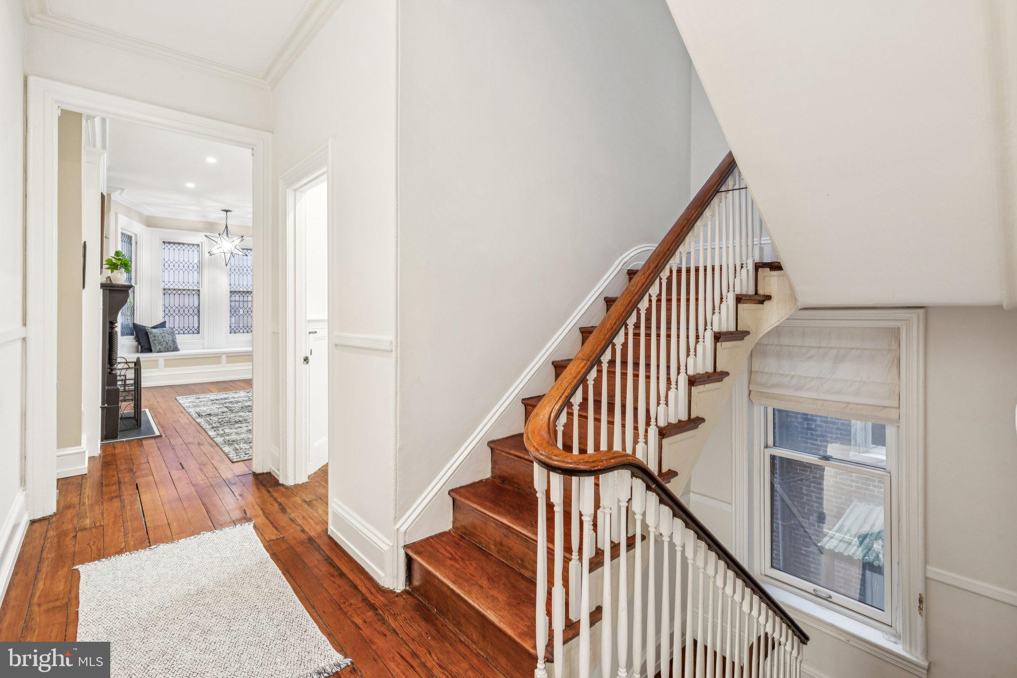 2221 Locust Street Philadelphia, PA 19103 - Photo 32 of 70 a view of entryway and hall with wooden floor