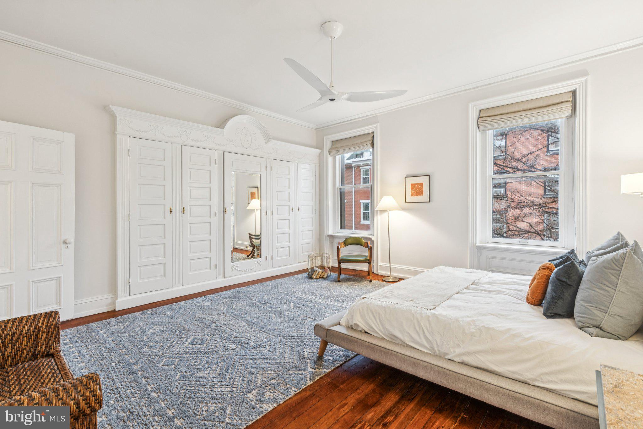 2221 Locust Street Philadelphia, PA 19103 - Photo 41 of 70 a bedroom with a bed and a couch