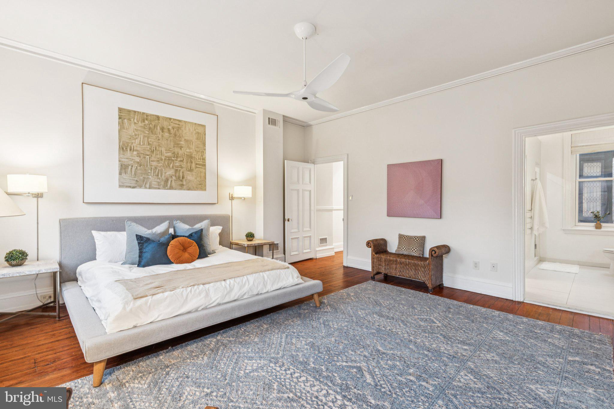2221 Locust Street Philadelphia, PA 19103 - Photo 43 of 70 a bedroom with a bed and couch
