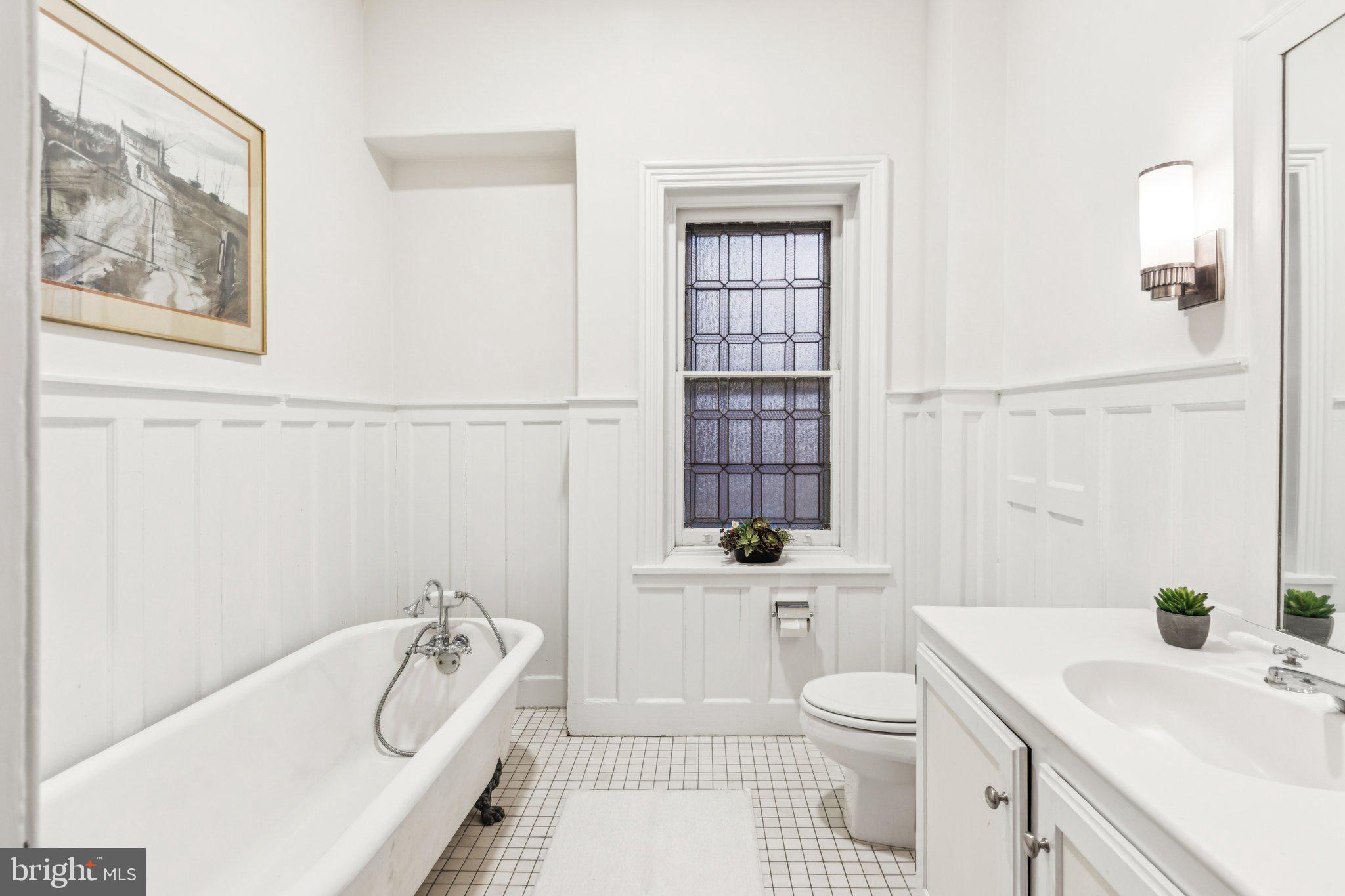 2221 Locust Street Philadelphia, PA 19103 - Photo 59 of 70 a bathroom with a sink a toilet and shower