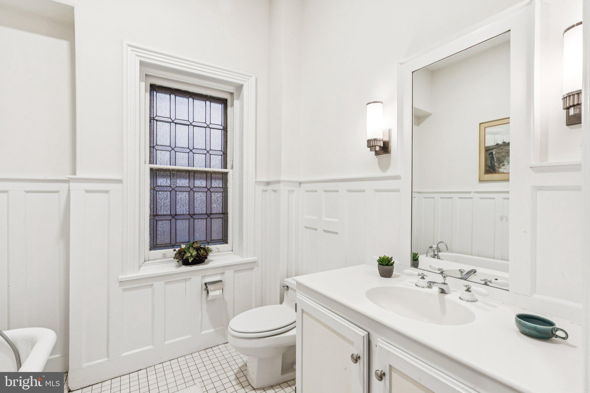 2221 Locust Street Philadelphia, PA 19103 - Photo 60 of 70 a bathroom with a sink a toilet and shower