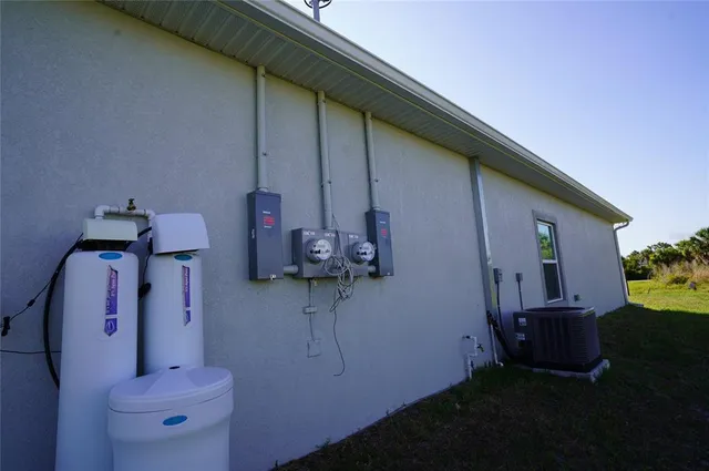 a view of storage and utility room with a sink