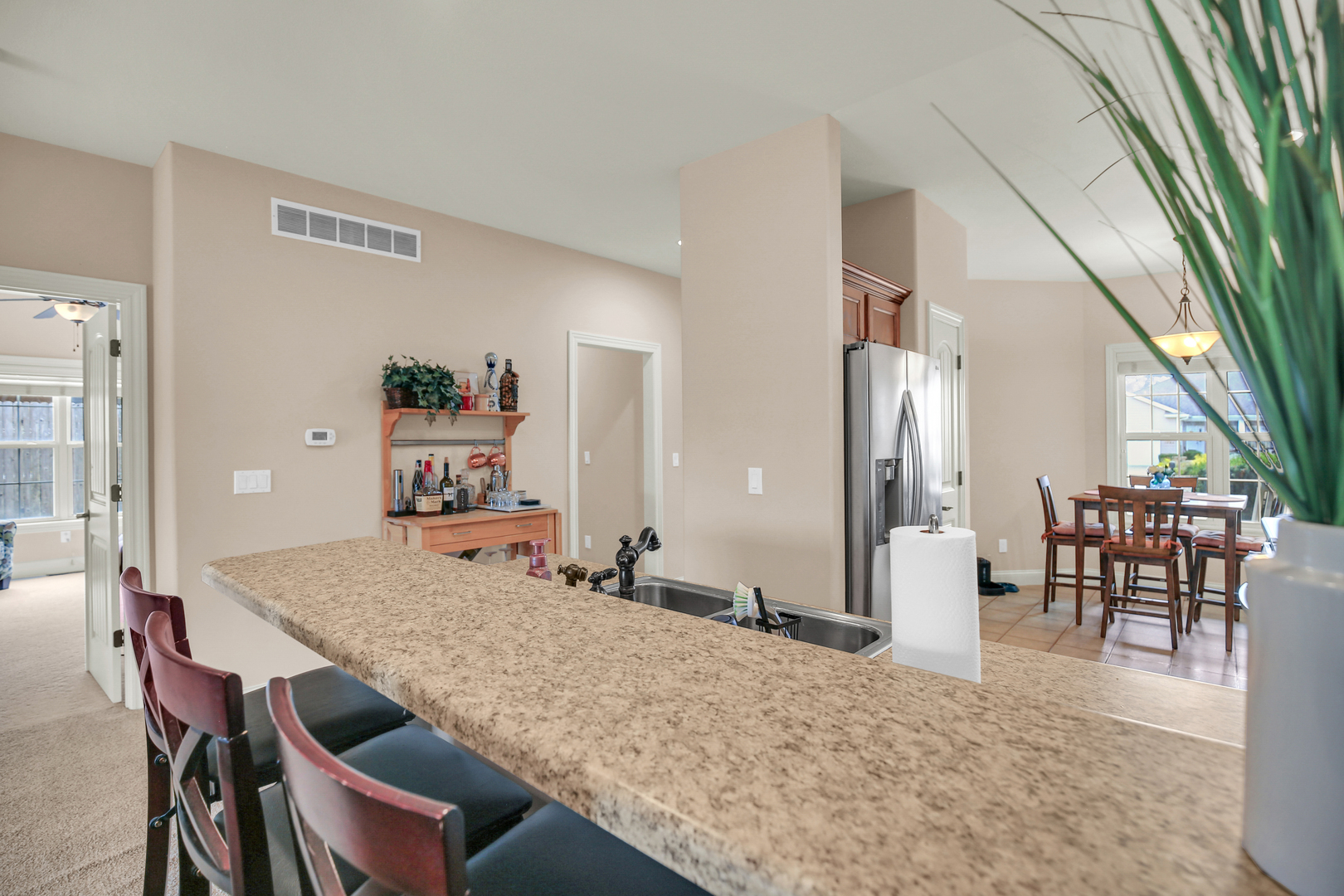 1504 Stonebluff Court, Unit 1504 Champaign, IL 61822 - Photo 7 of 23 a view of a dining room with furniture