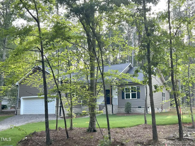a picture of a bathroom with a shower
