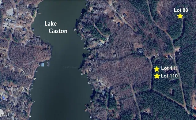 a view of a lake with a city from a lake