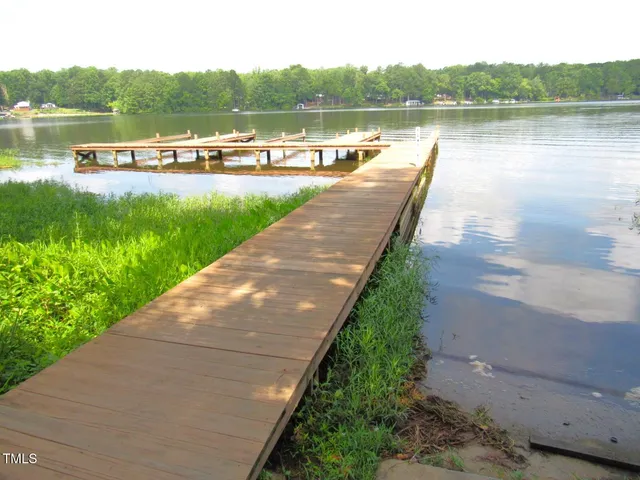 a view of a lake with houses with outdoor space