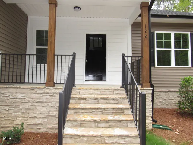a front view of a house with a window