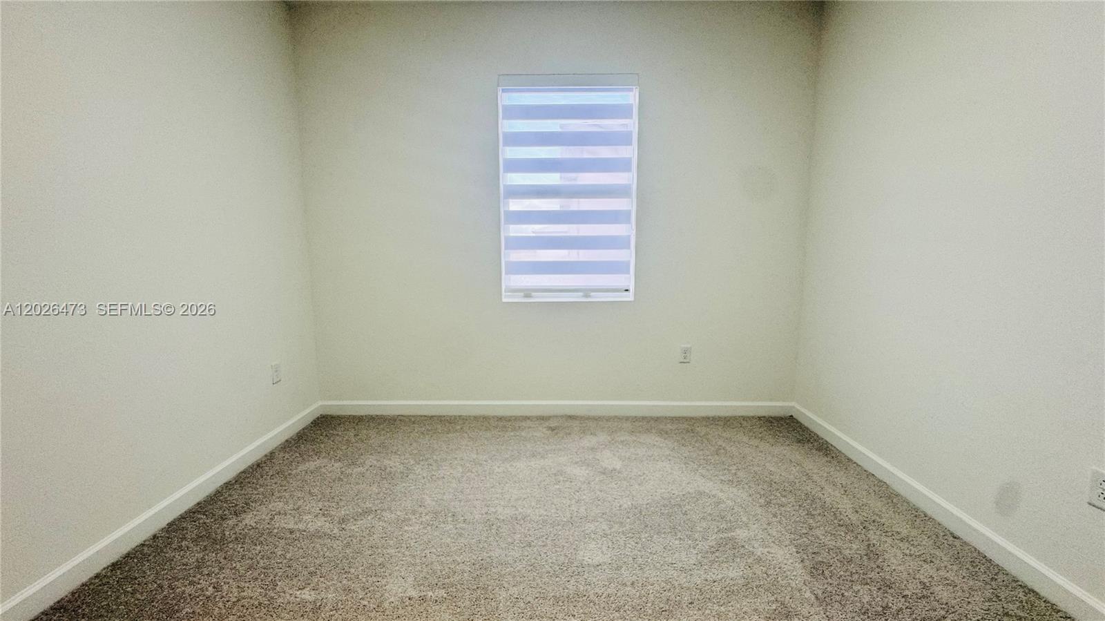 19479 Southwest 340th Street, Unit 1 Homestead, FL 33034 - Photo 20 of 58 a view of room and window