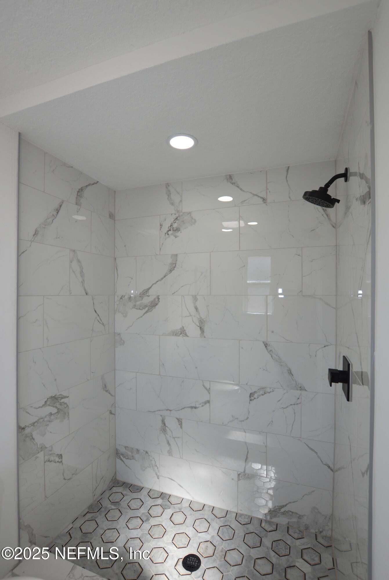 7941 Alderman Road Jacksonville, FL 32211 - Photo 18 of 40 a bathroom with a shower