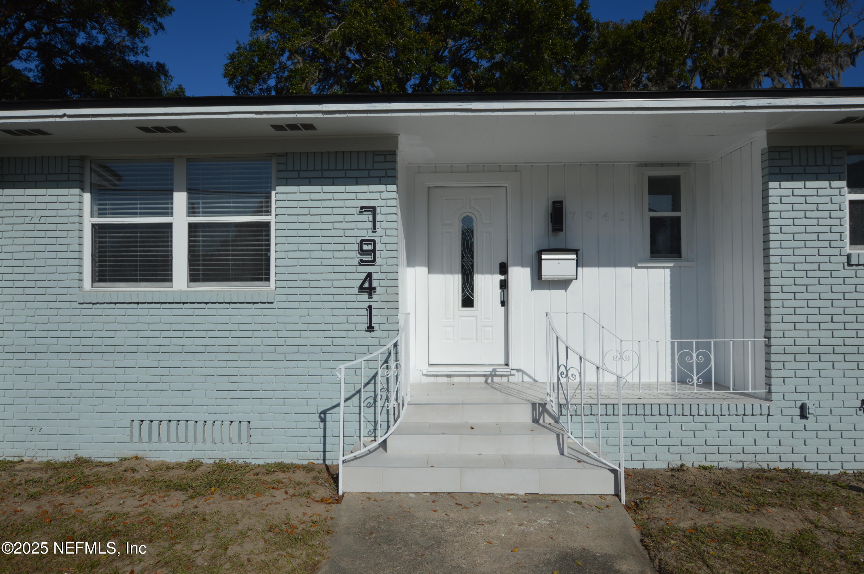 7941 Alderman Road Jacksonville, FL 32211 - Photo 2 of 40 a view of a house with a garage