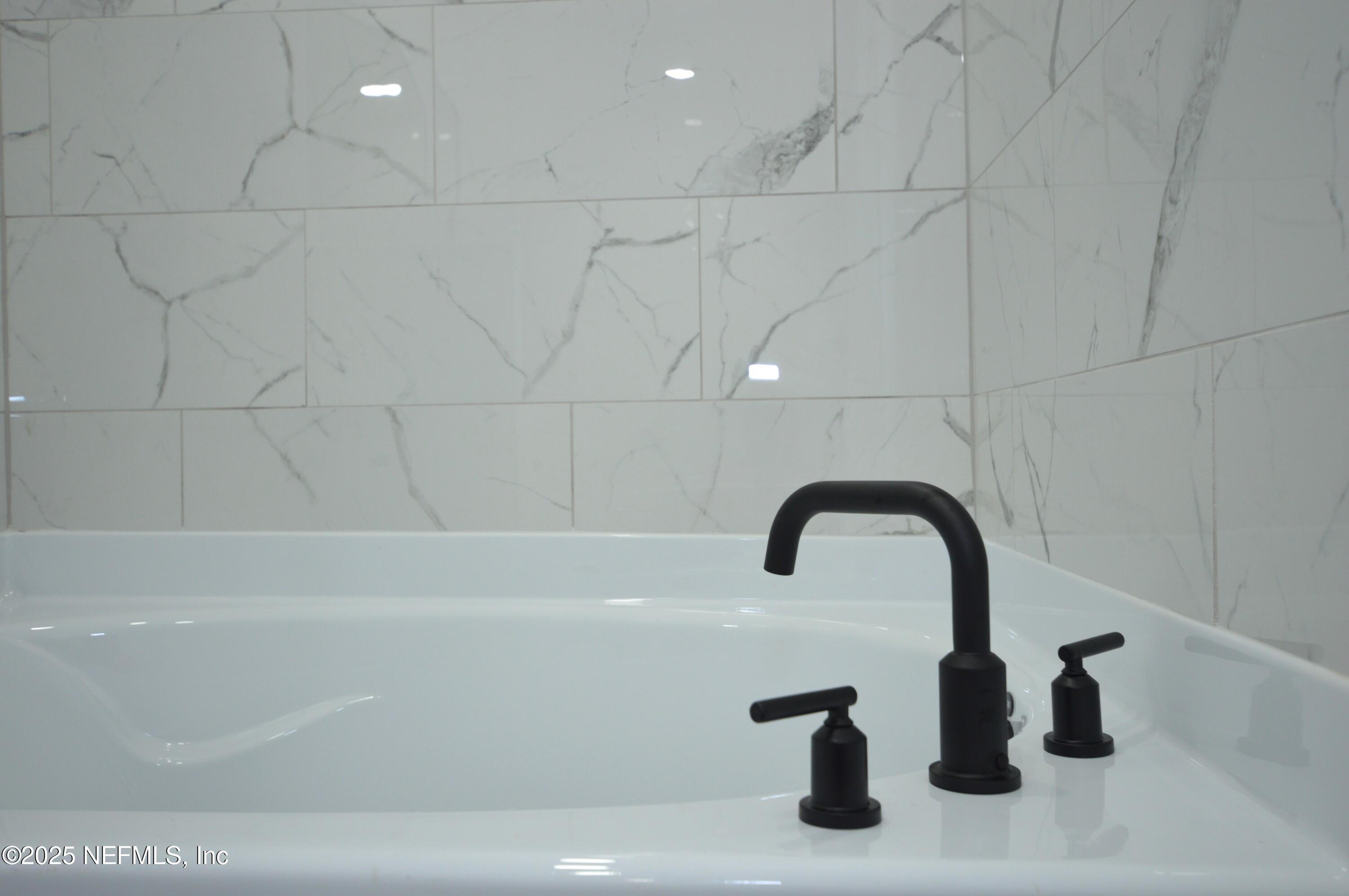 7941 Alderman Road Jacksonville, FL 32211 - Photo 27 of 40 a bathroom with a sink