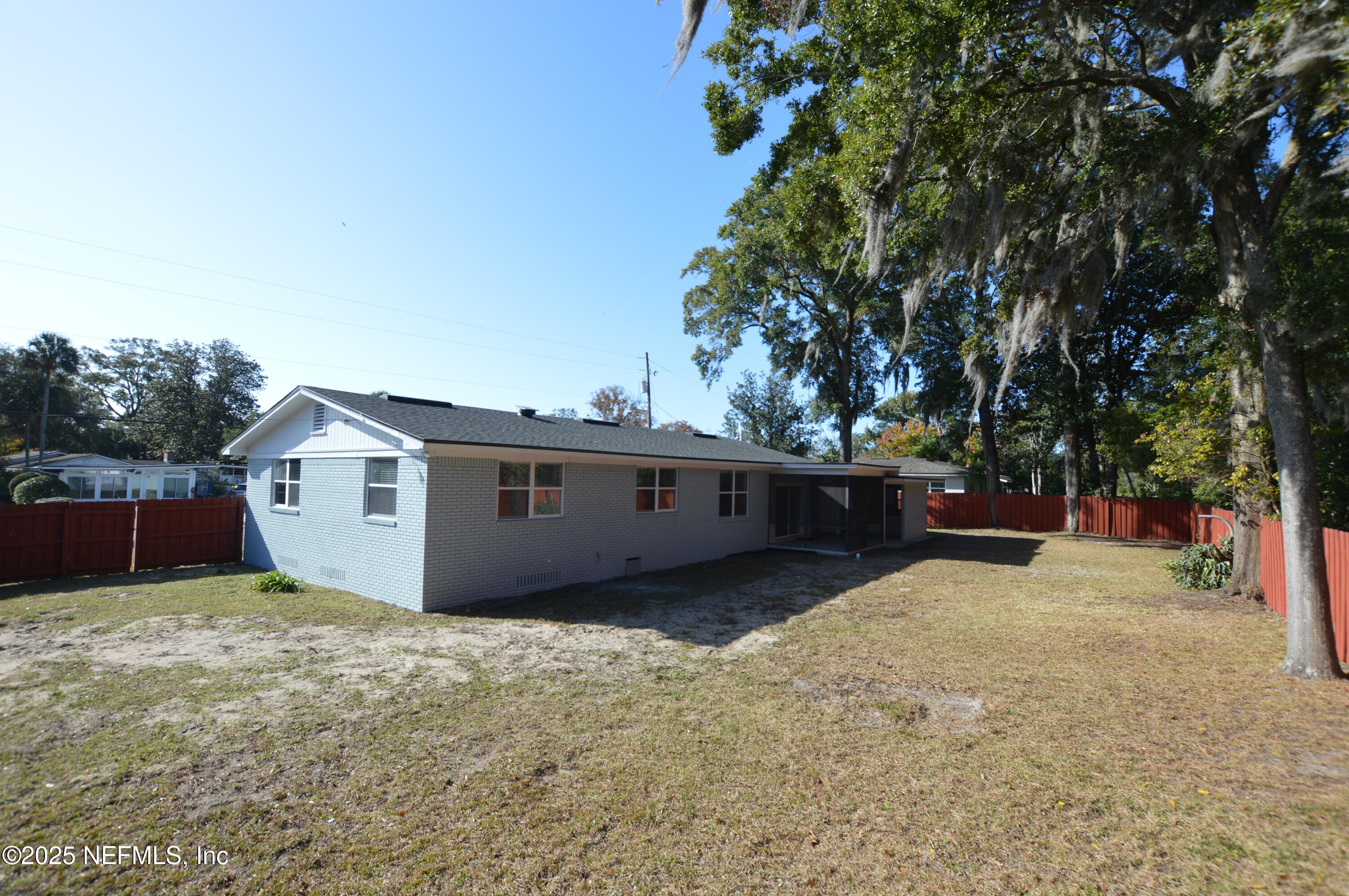 7941 Alderman Road Jacksonville, FL 32211 - Photo 34 of 40 a view of a house with a yard