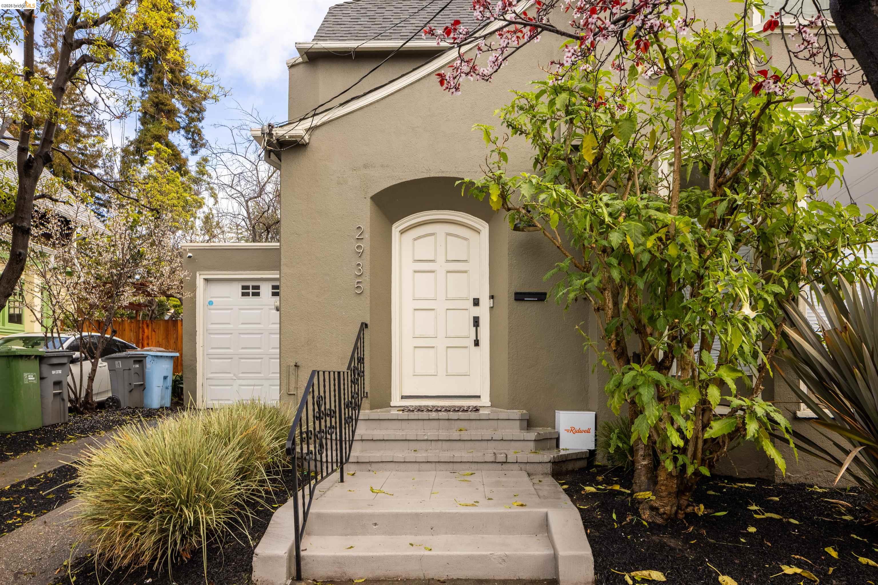 2935 Florence Street Berkeley, CA 94705 - Photo 1 of 12 a front view of a house with a garden