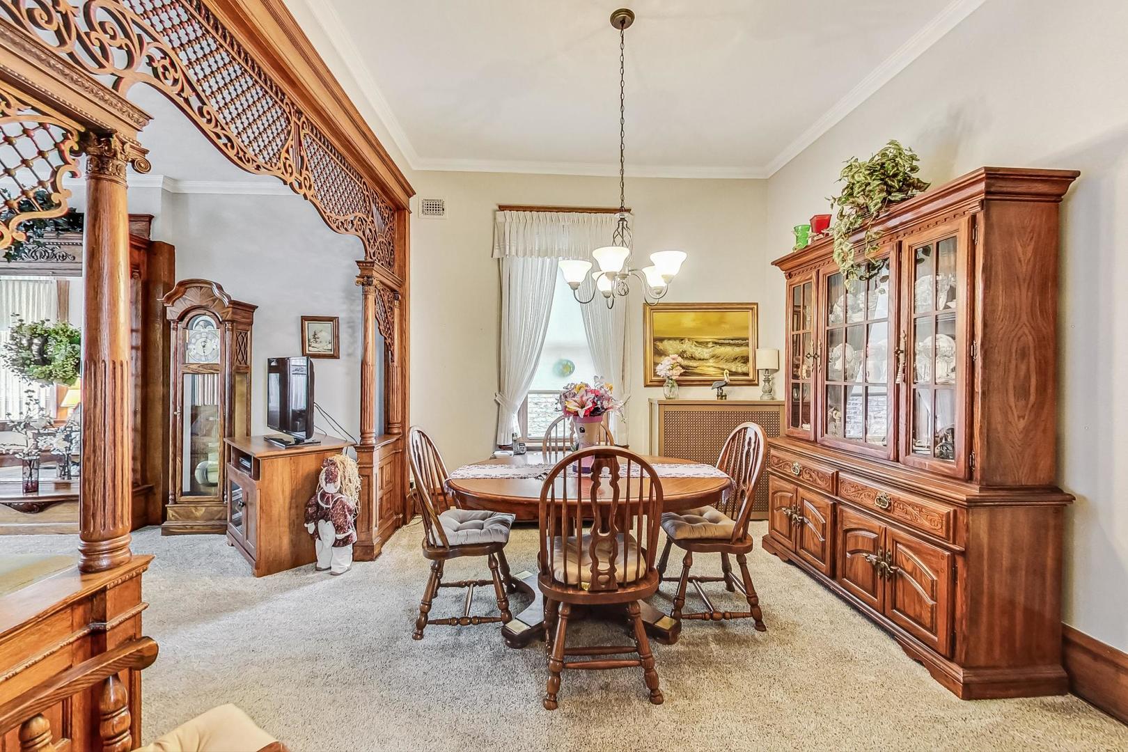 2954 South Loomis Street Chicago, IL 60608 - Photo 12 of 80 a view of a dining room with furniture window and outside view