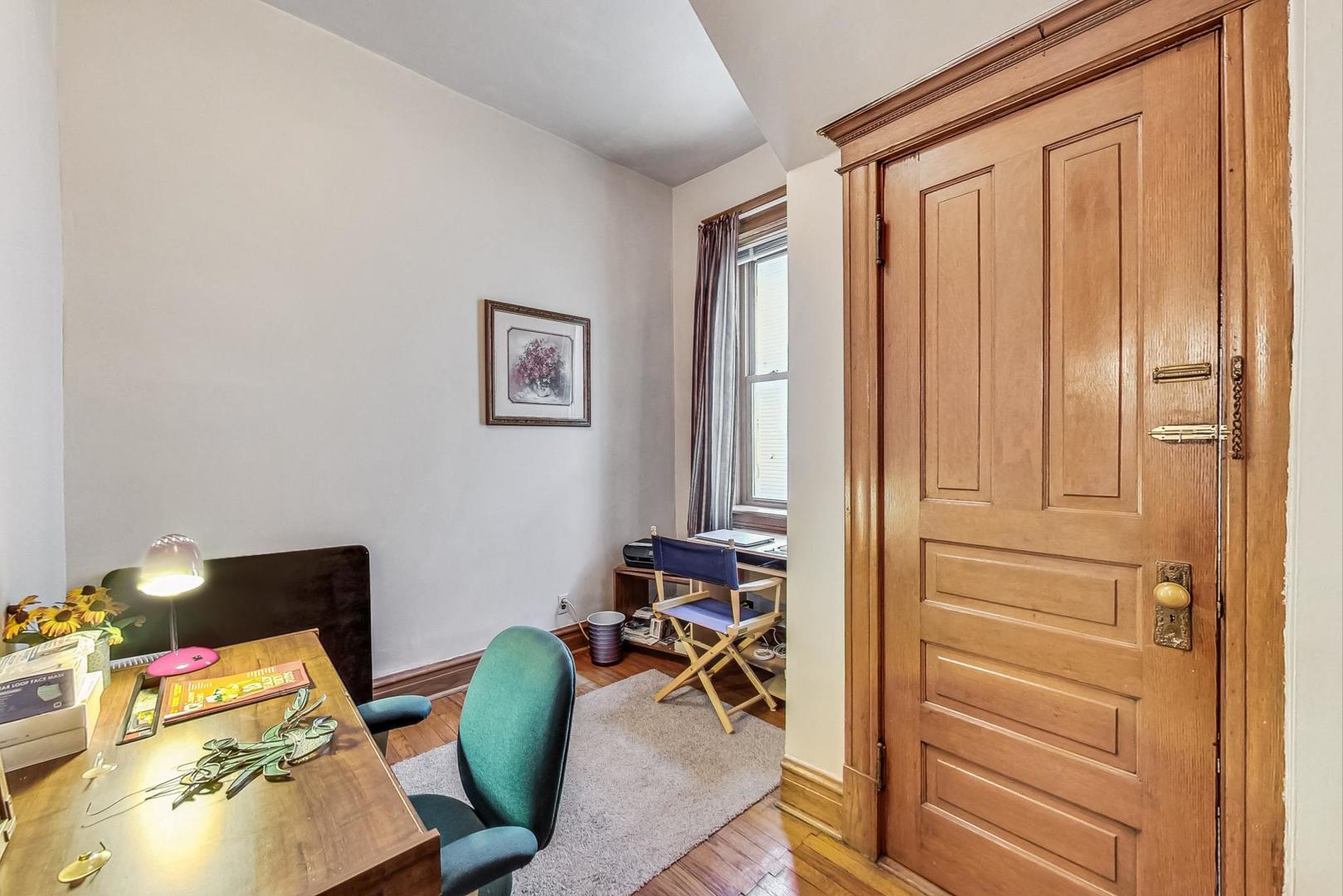 2954 South Loomis Street Chicago, IL 60608 - Photo 24 of 80 a view of a workspace with furniture and a window