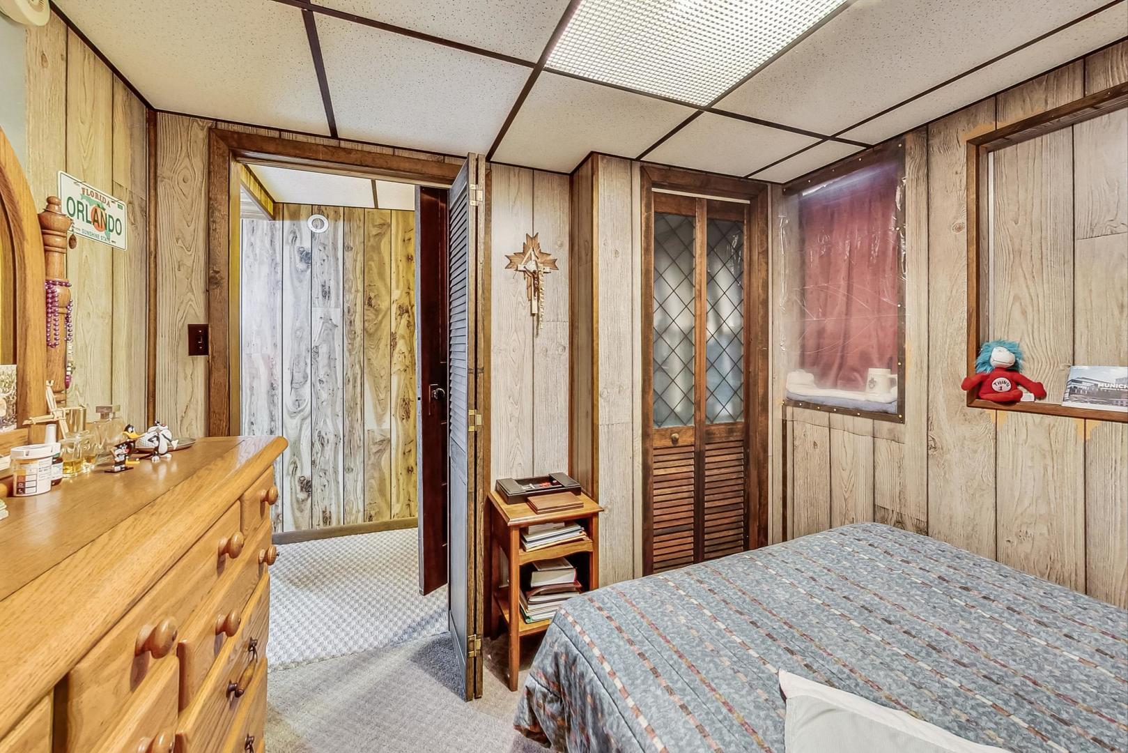2954 South Loomis Street Chicago, IL 60608 - Photo 35 of 80 a bedroom with a bed and a dresser