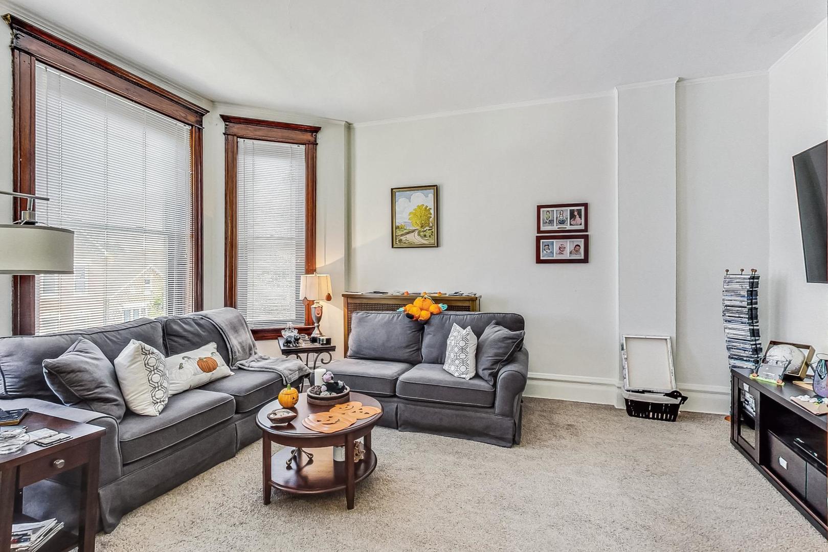 2954 South Loomis Street Chicago, IL 60608 - Photo 40 of 80 a living room with furniture and a window