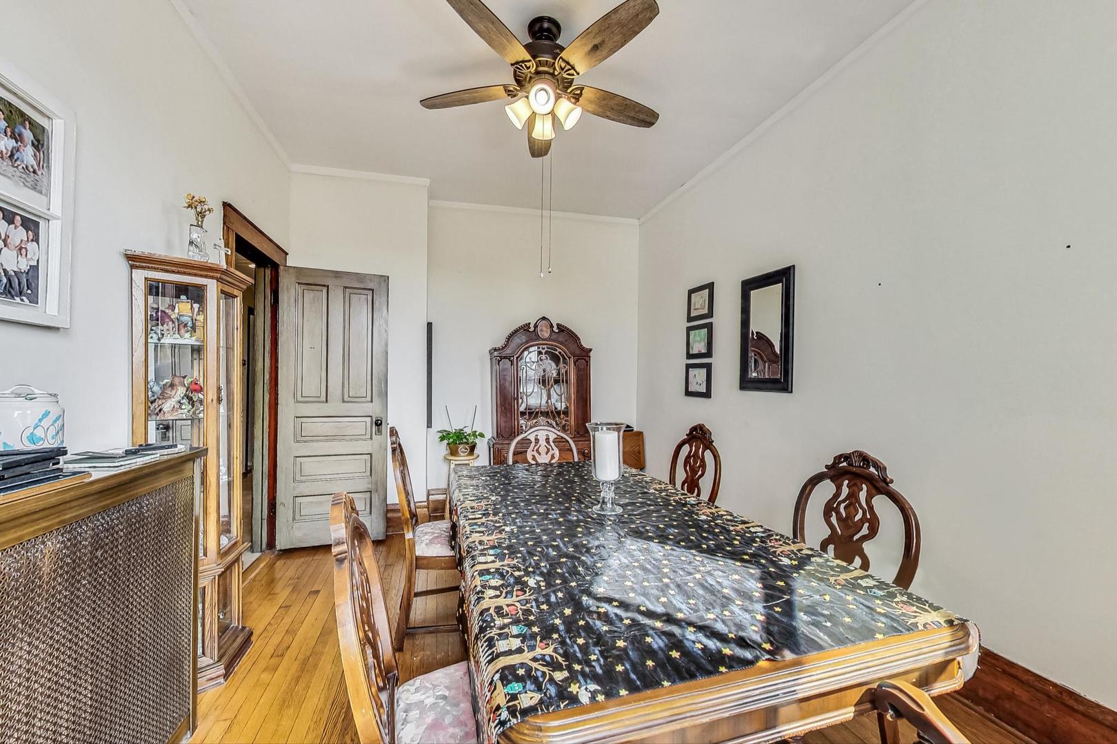 2954 South Loomis Street Chicago, IL 60608 - Photo 46 of 80 a bedroom with furniture and a chandelier