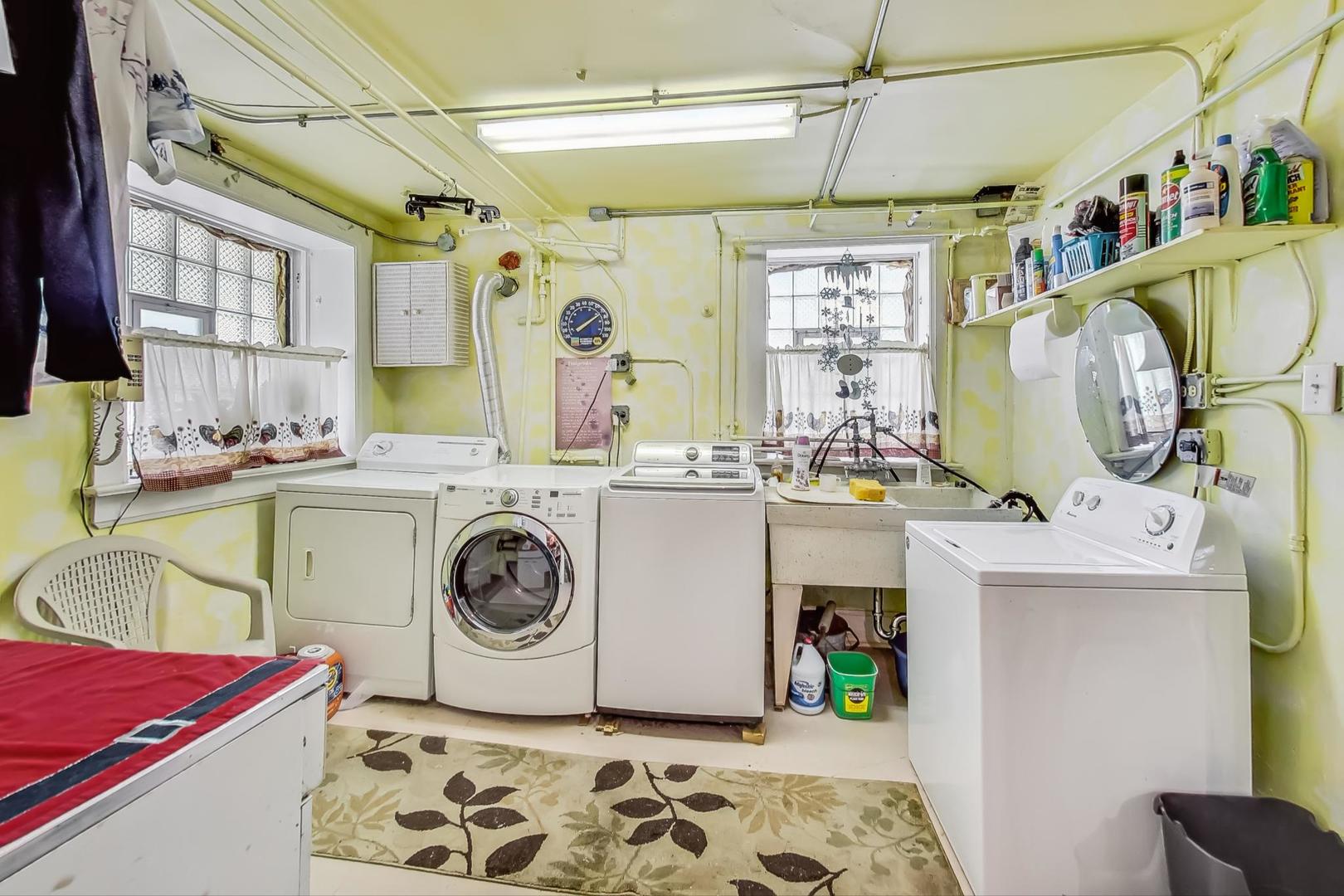 2954 South Loomis Street Chicago, IL 60608 - Photo 63 of 80 a utility room with a refrigerator a washer and dryer