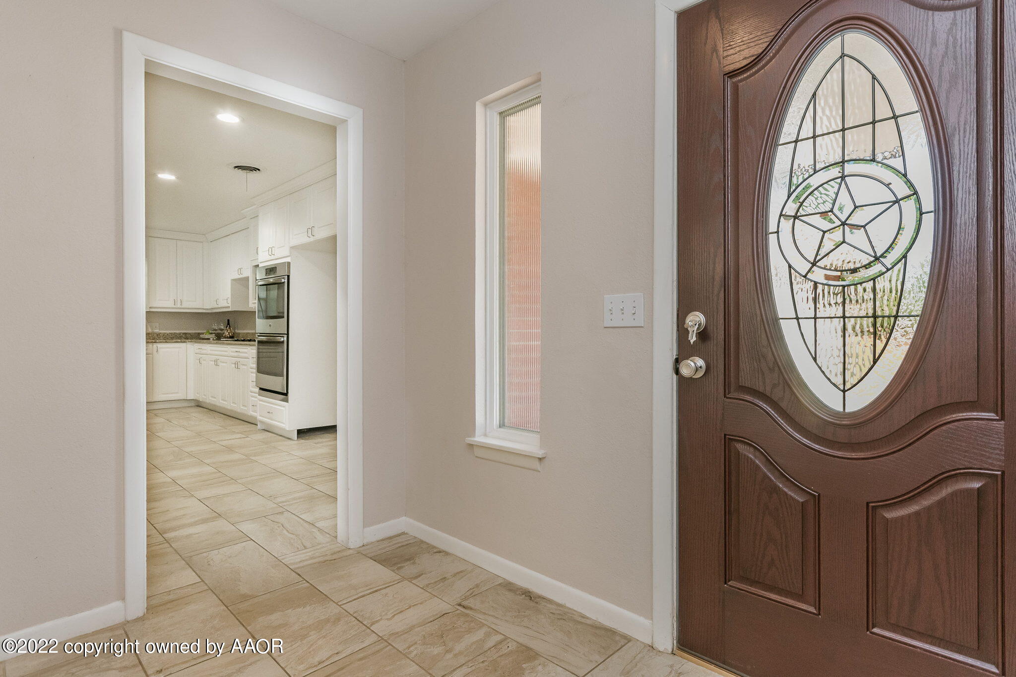 6107 Gainsborough Road Amarillo, TX 79106 - Photo 2 of 23 a view of a hallway with washer and dryer