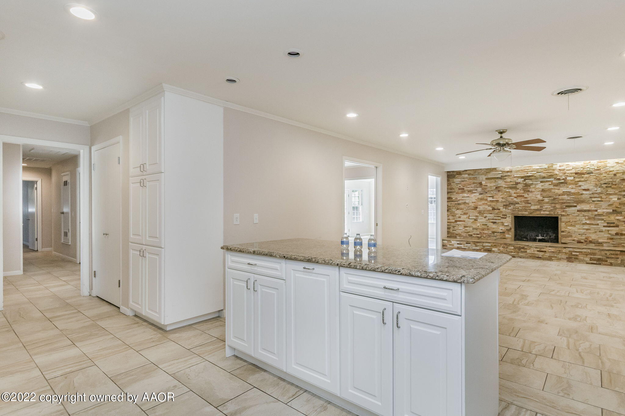6107 Gainsborough Road Amarillo, TX 79106 - Photo 5 of 23 a spacious bathroom with a granite countertop sink and a mirror
