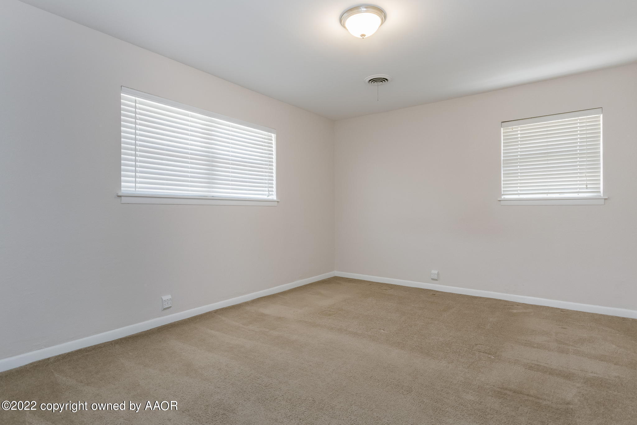 6107 Gainsborough Road Amarillo, TX 79106 - Photo 10 of 23 an empty room with a window
