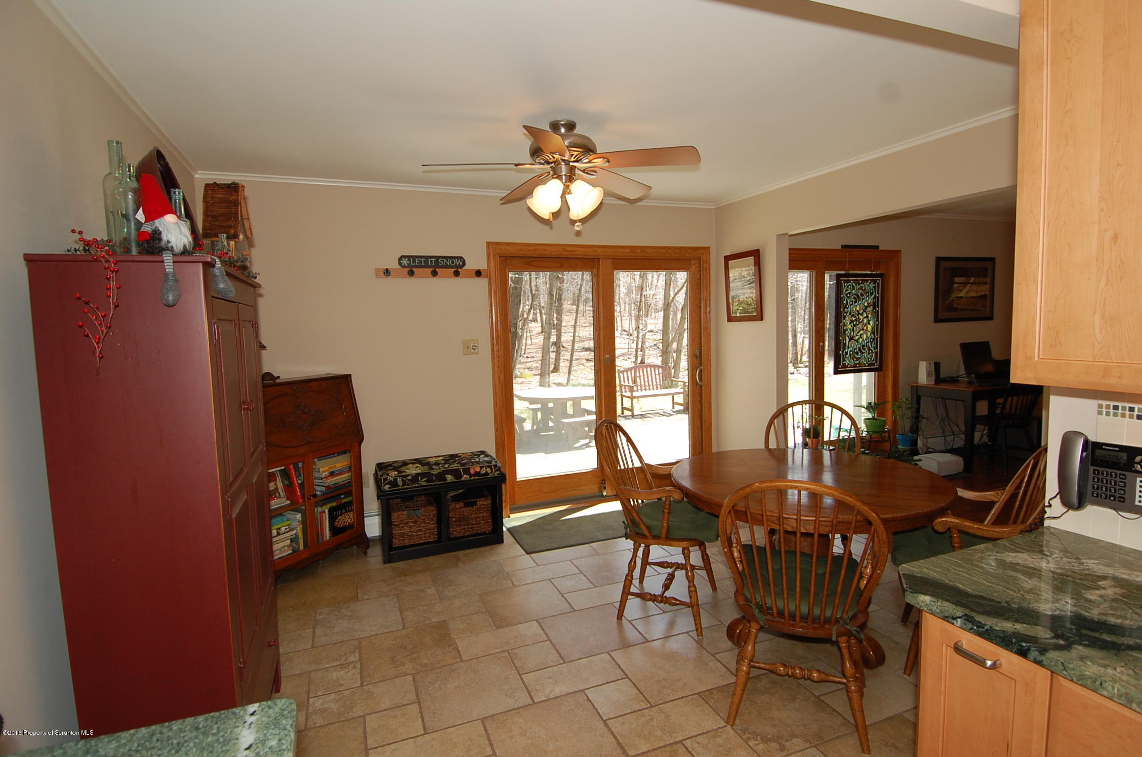 60 Tinker Brook Road Forest City, PA 18421 - Photo 5 of 62 a view of a dining room with furniture and a chandelier
