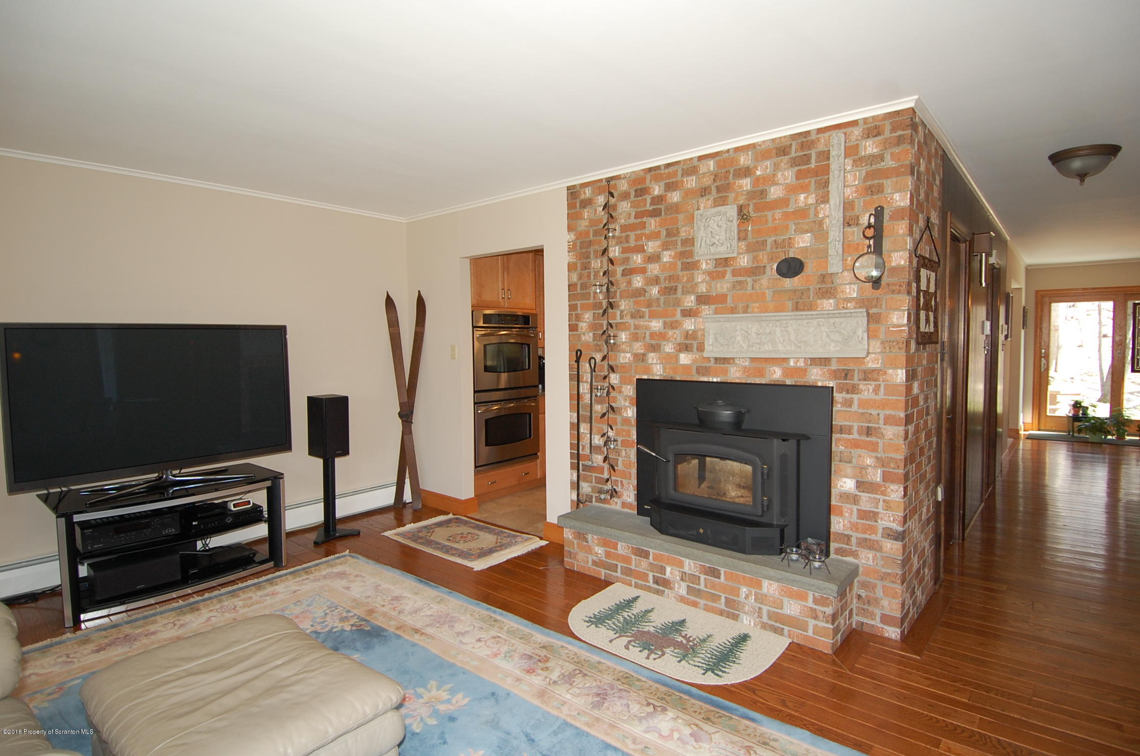 60 Tinker Brook Road Forest City, PA 18421 - Photo 9 of 62 a living room with furniture and a fireplace