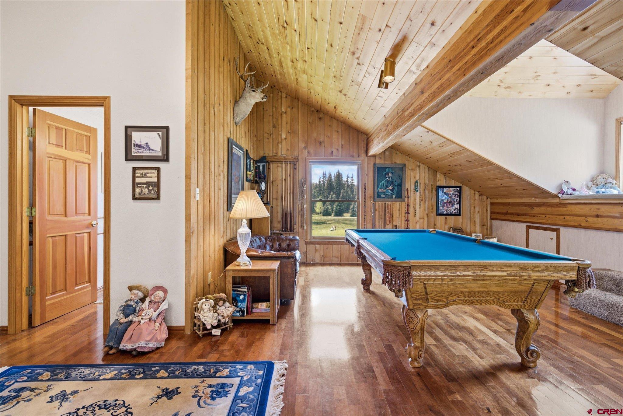 197 Hummingbird Way Bayfield, CO 81122 - Photo 20 of 44 a living room with furniture and wooden floor