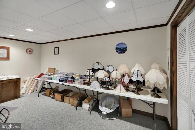 a bathroom with a sink mirror and toilet