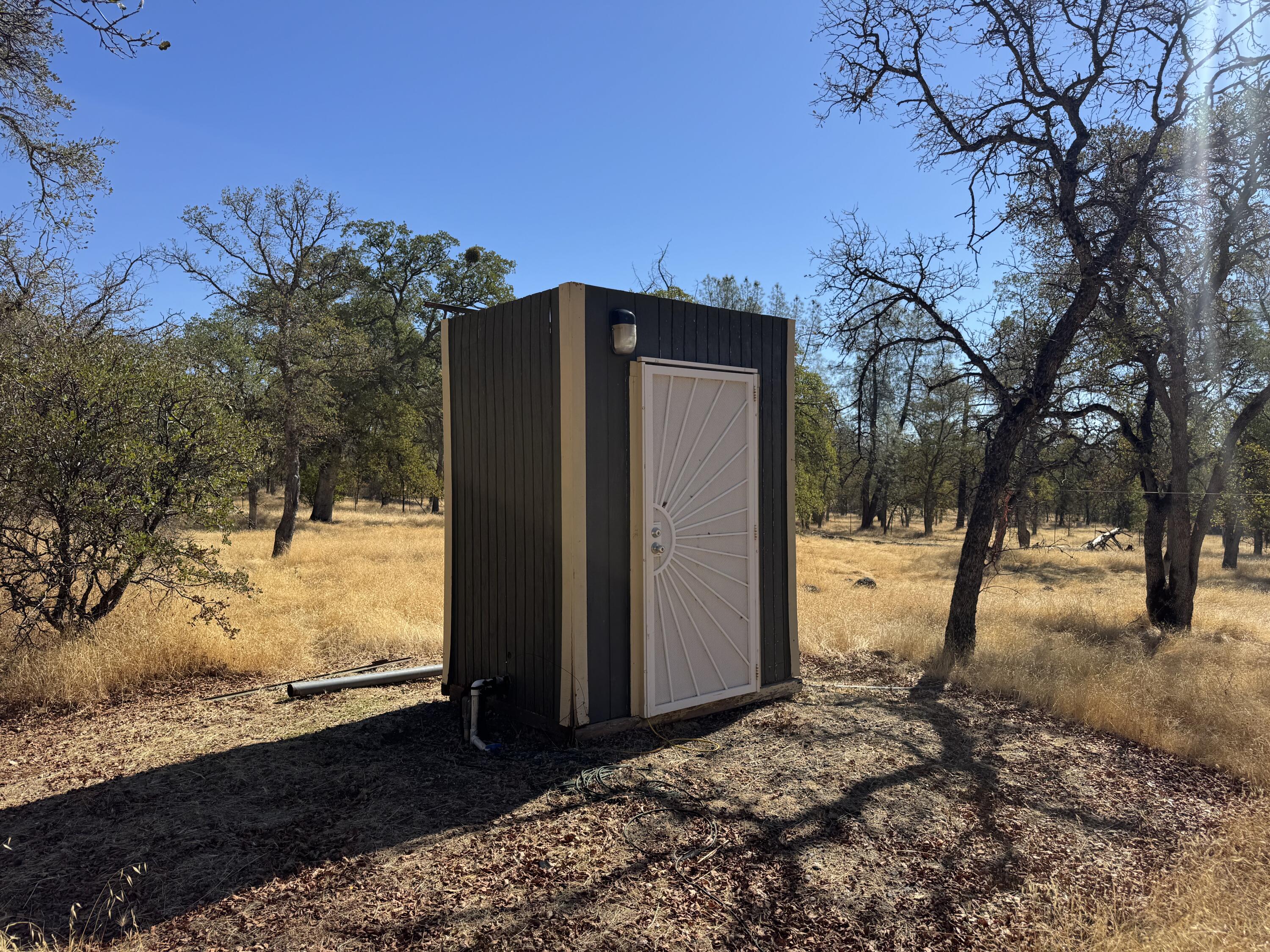 26612 Scharsch Road Shingletown, CA 96088 - Photo 13 of 20 a view of a yard with a tree