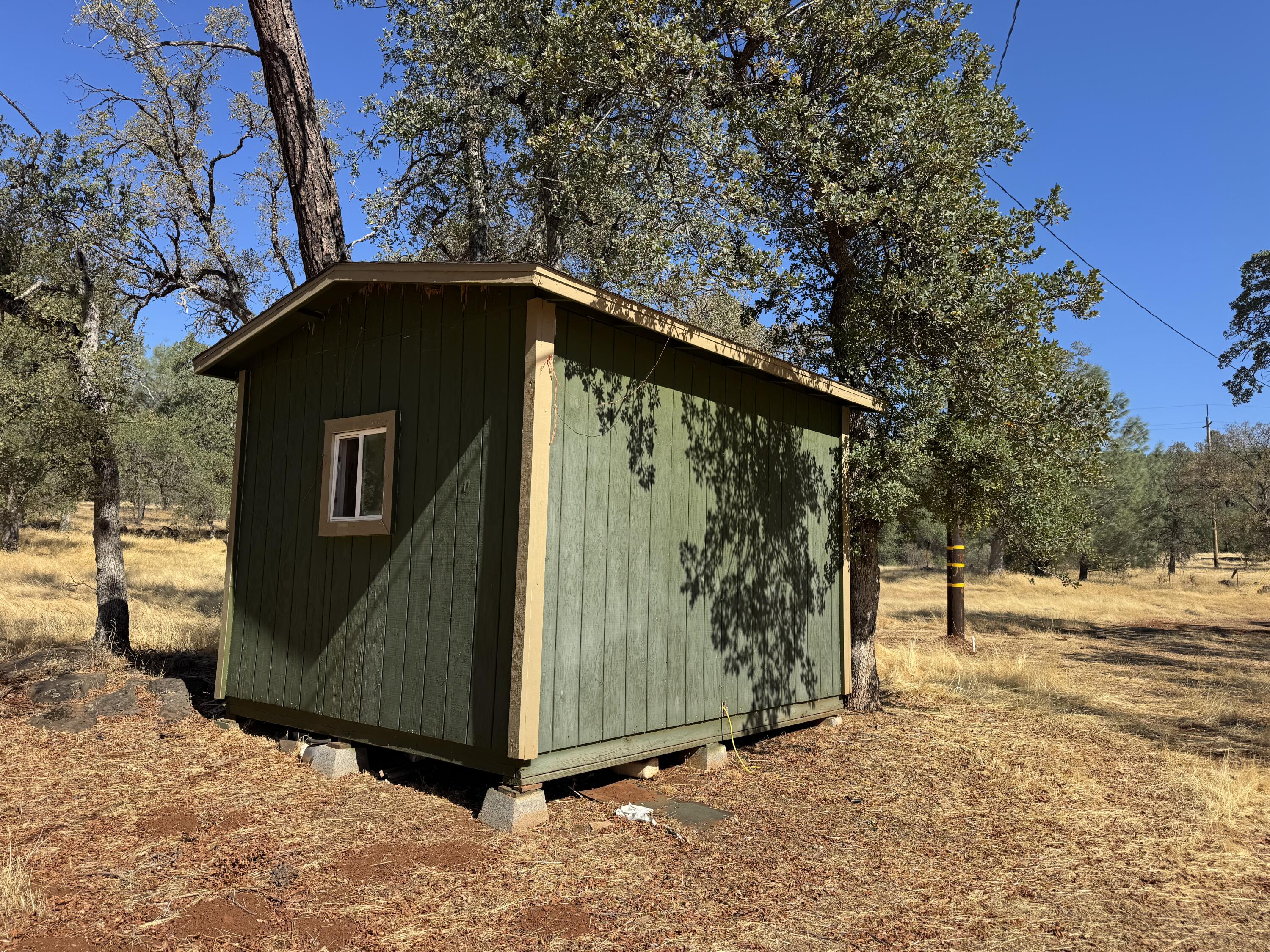 26612 Scharsch Road Shingletown, CA 96088 - Photo 8 of 20 a front view of a house with a yard