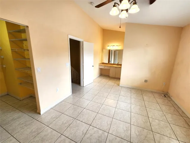 a view of a livingroom with a dinning table and chair