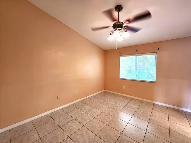 a view of an empty room and window