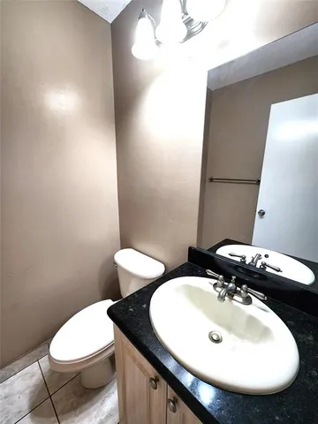 a bathroom with a sink and a toilet