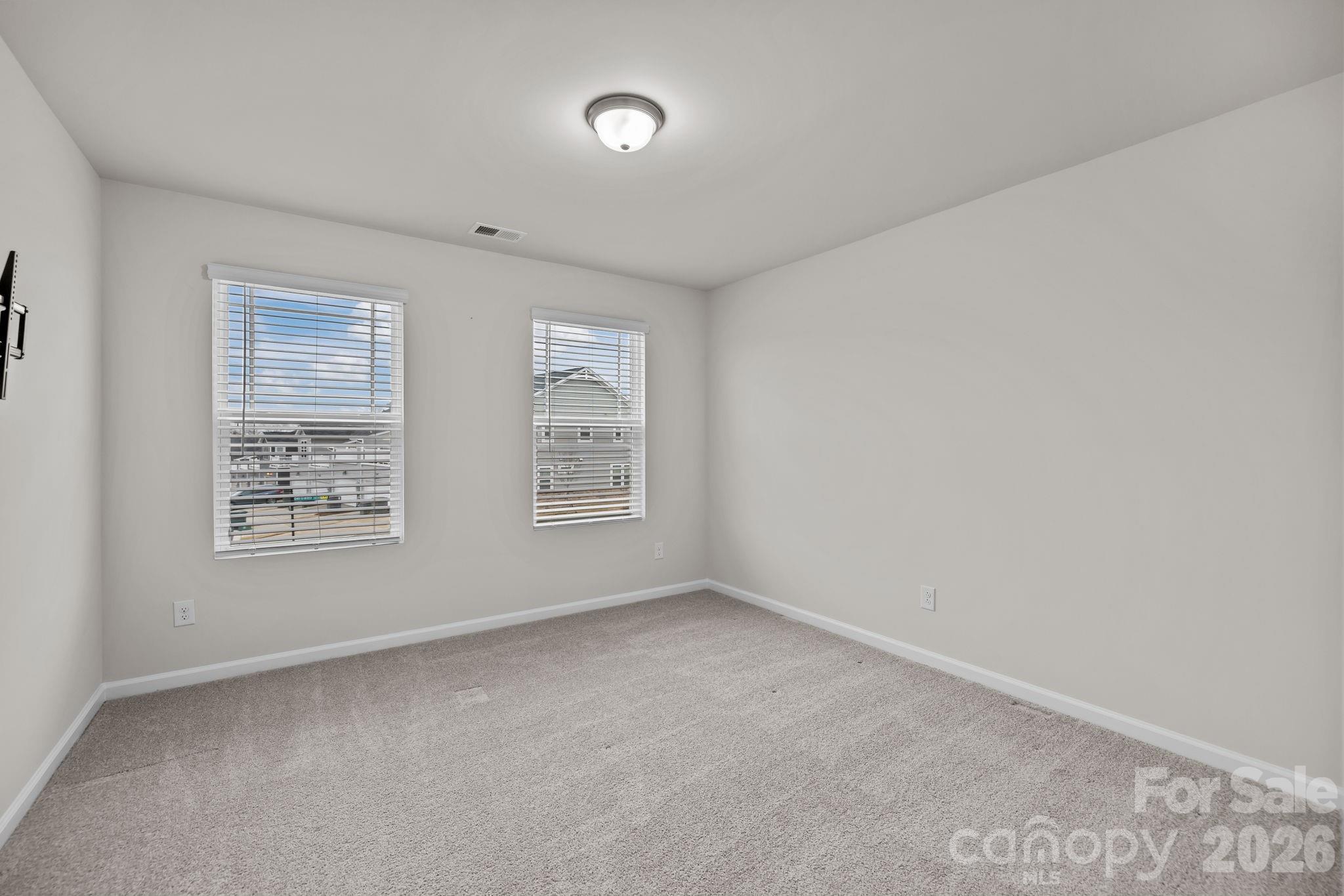 11246 Bartrams Way Charlotte, NC 28278 - Photo 22 of 31 an empty room with a window