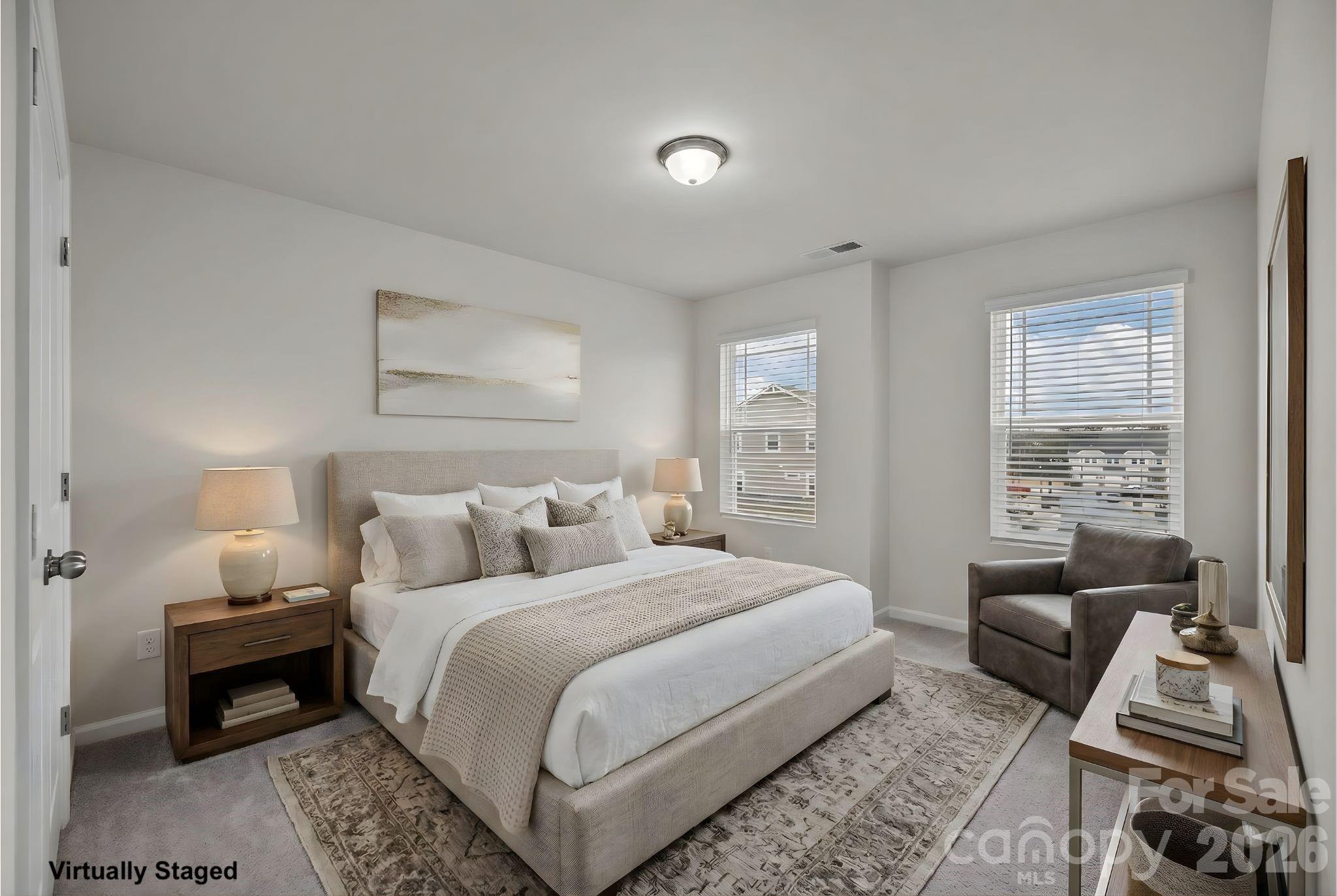 11246 Bartrams Way Charlotte, NC 28278 - Photo 24 of 31 a bedroom with a bed and wooden floor