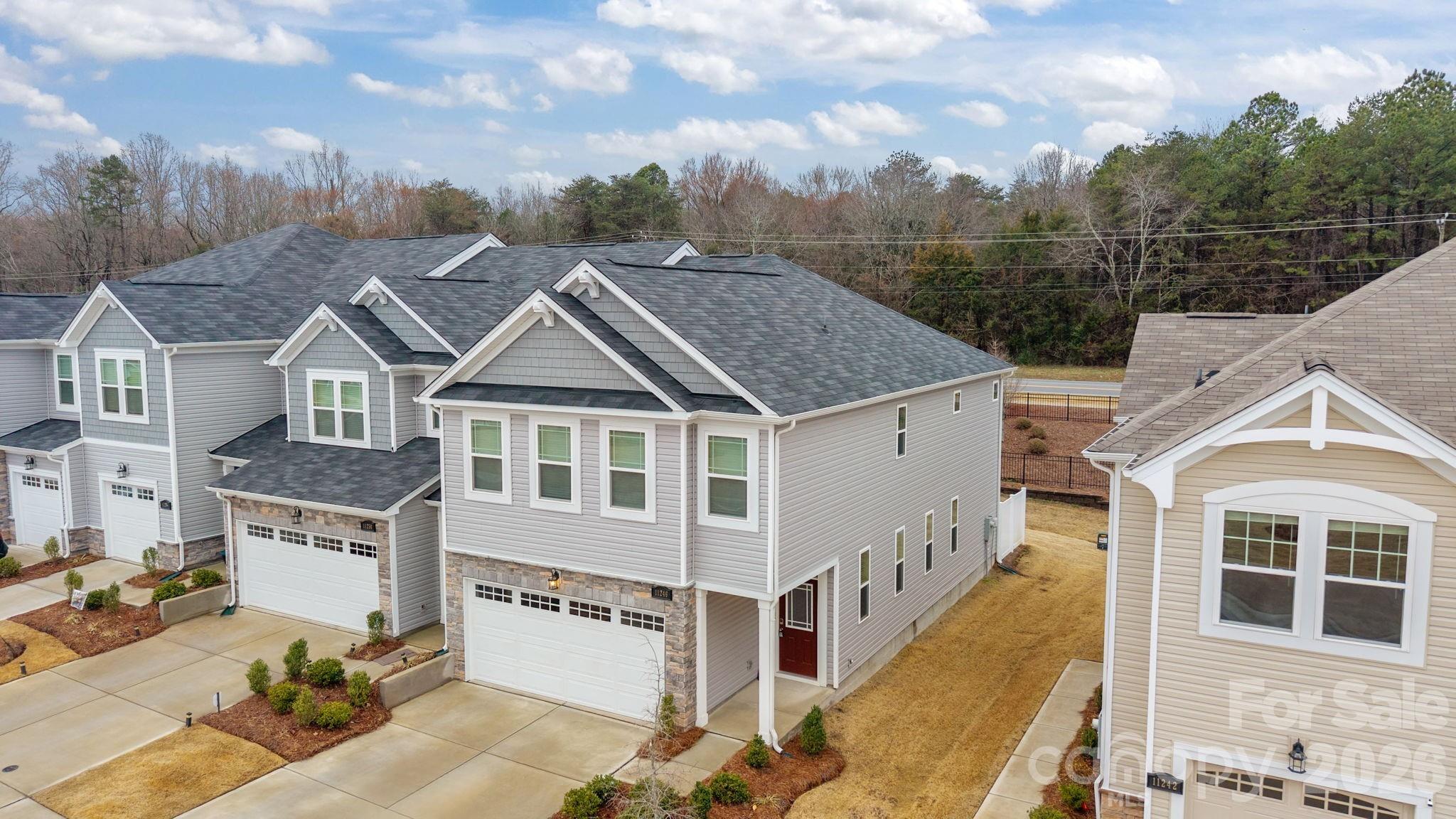 11246 Bartrams Way Charlotte, NC 28278 - Photo 28 of 31 aerial view of a house with a yard