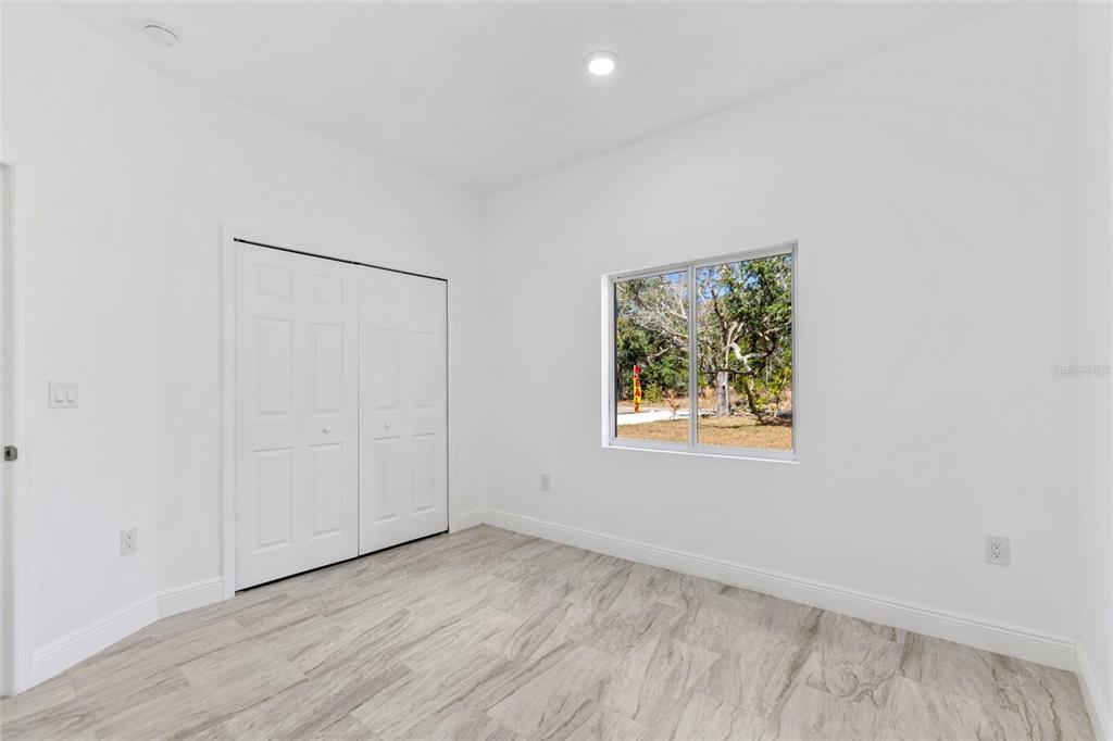 3121 Gardenia Drive Indian Lake Estates, FL 33855 - Photo 19 of 55 an empty room with a window