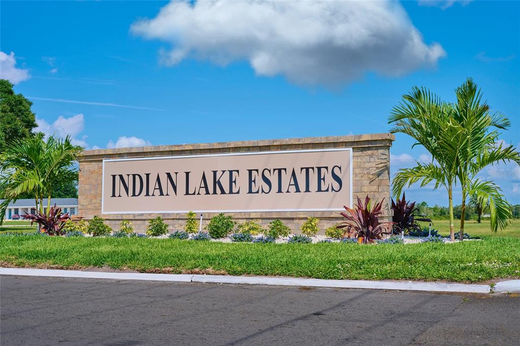3121 Gardenia Drive Indian Lake Estates, FL 33855 - Photo 30 of 55 a sign on the side of a building
