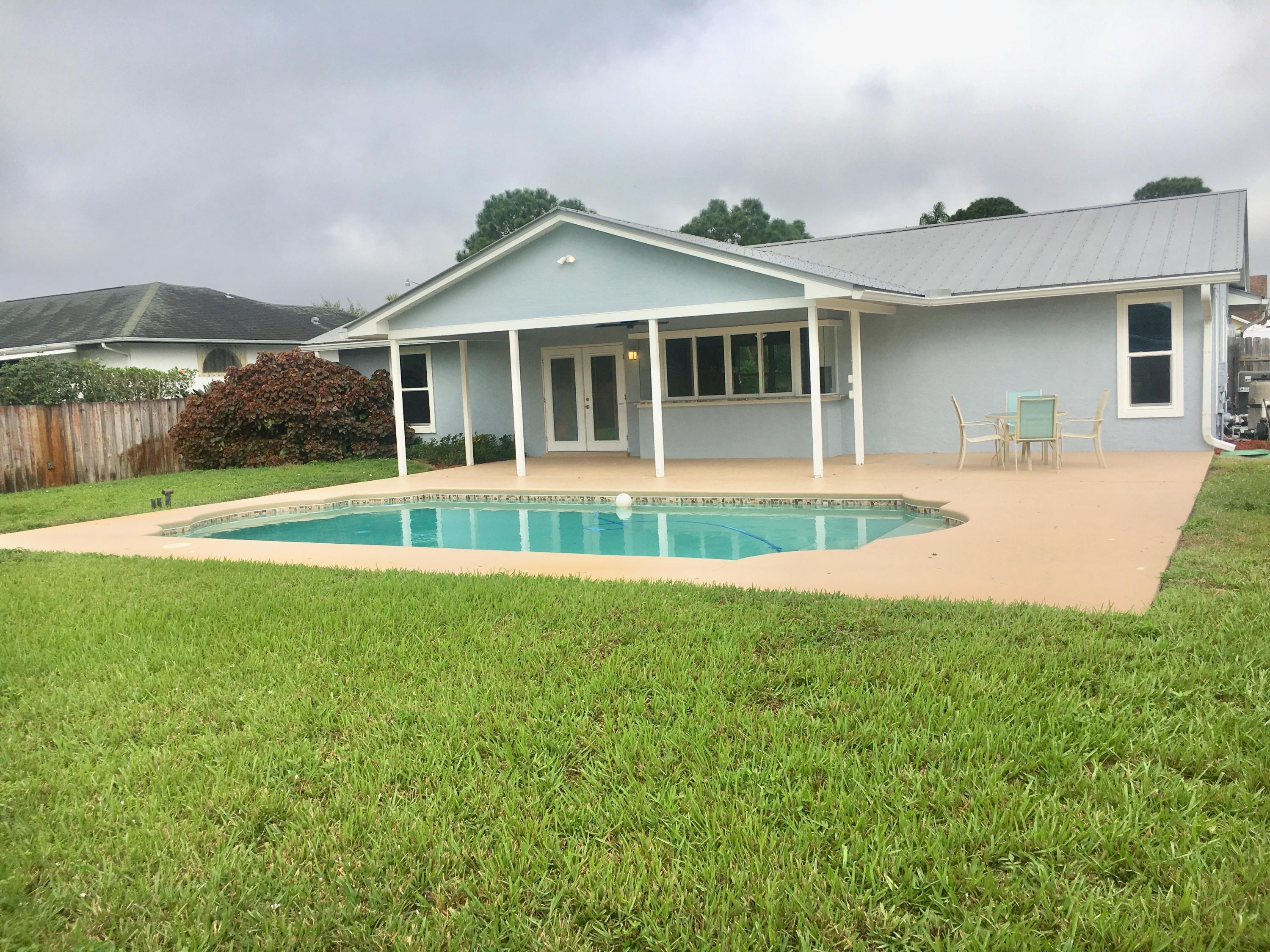 756 Southwest Ancona Road Port St. Lucie, FL 34953 - Photo 8 of 17 POOL VIEW