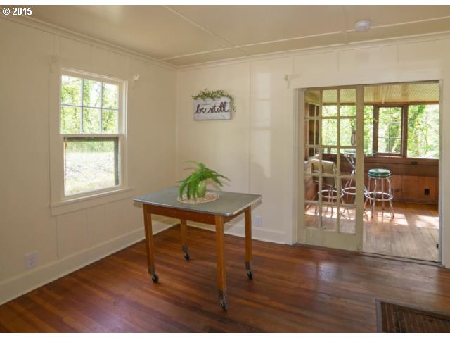 36526 Jasper Road Springfield, OR 97478 - Photo 5 of 16 a view of a livingroom with furniture window and wooden floor