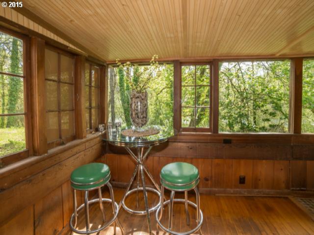 36526 Jasper Road Springfield, OR 97478 - Photo 7 of 16 a dining room with furniture and a large window
