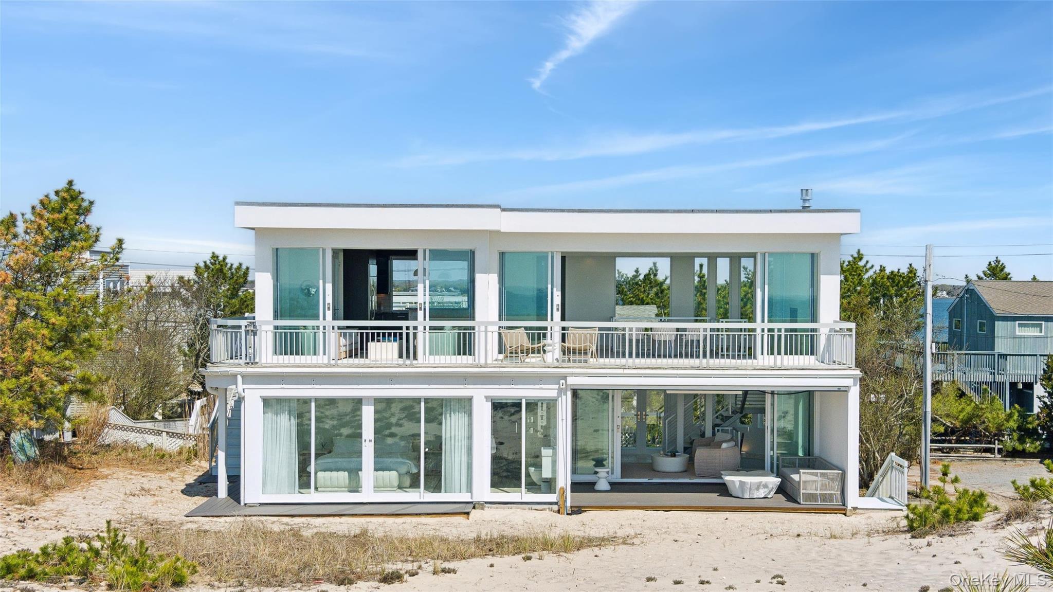 413 B Dune Road Westhampton Beach, NY 11978 - Photo 1 of 26 front view of house with a entrance