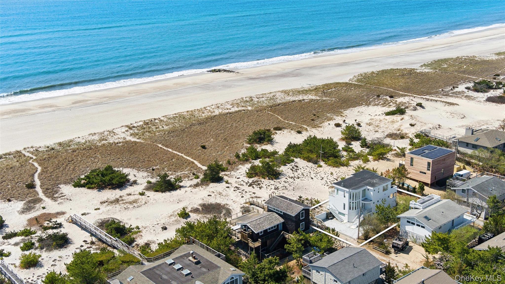 413 B Dune Road Westhampton Beach, NY 11978 - Photo 25 of 26 a view of city and ocean