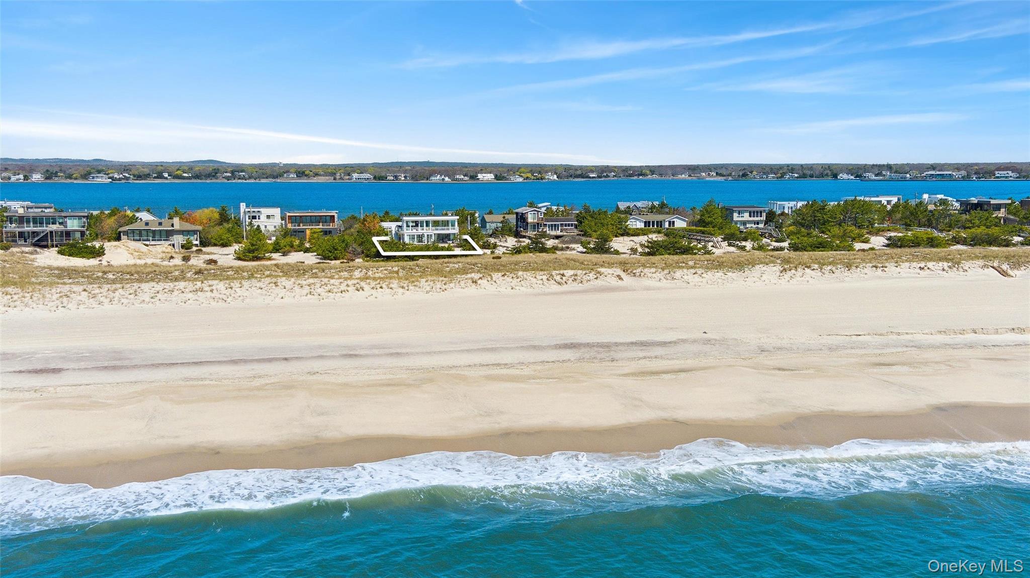 413 B Dune Road Westhampton Beach, NY 11978 - Photo 26 of 26 a view of an ocean and beach
