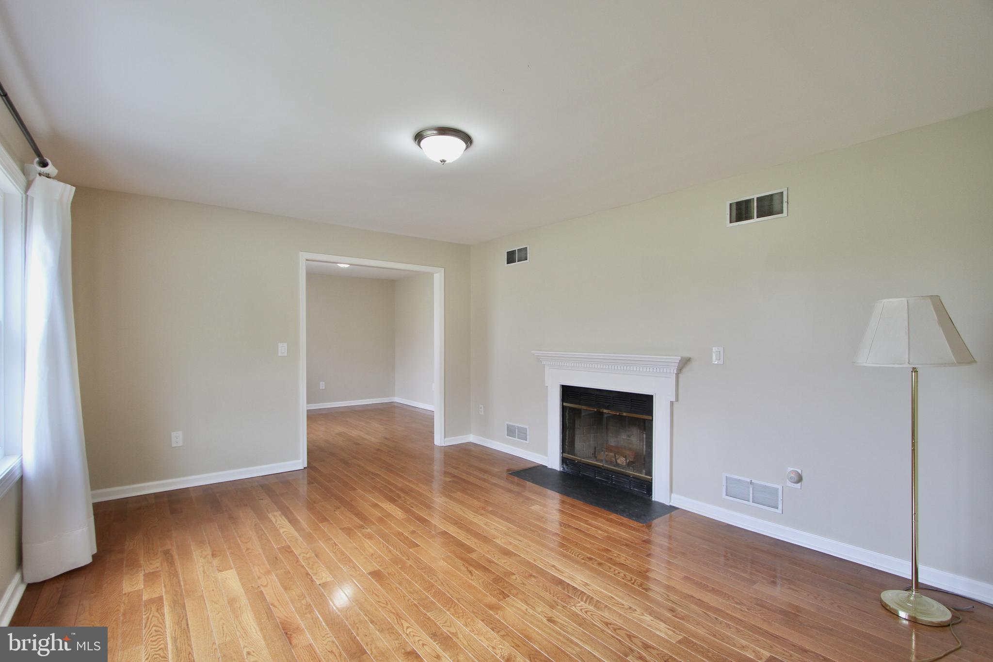14 Concord Road Dover, DE 19904 - Photo 7 of 50 Living Room with Fireplace & Hardwood floors