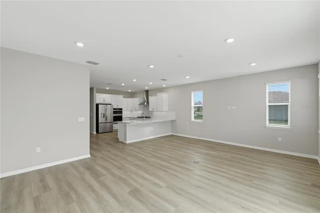 a view of kitchen dining table and kitchen view