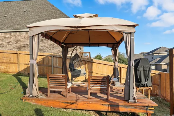 an outdoor space with lounge chairs