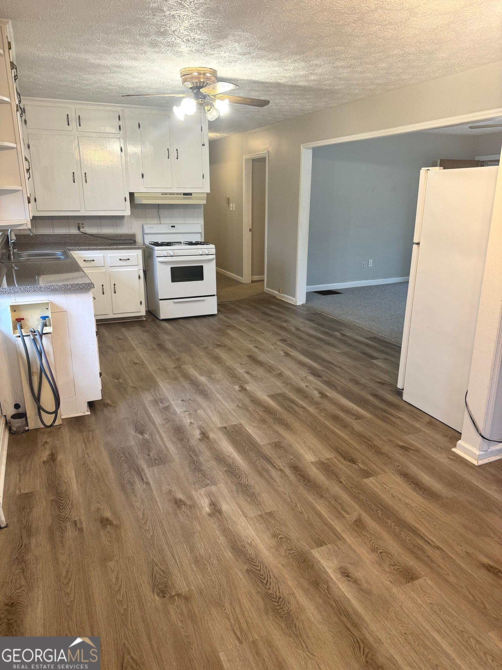 2308 Kelleytown Road McDonough, GA 30252 - Photo 8 of 13 a view of kitchen and sink